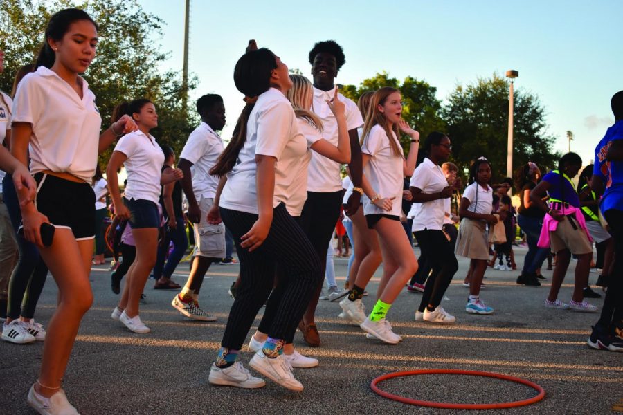 FAIL TO THE BEAT. Bethune kids and NHS members dance together at the center of the festival