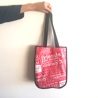 The Lululemon red tote bag that has become famous at Suncoast.  