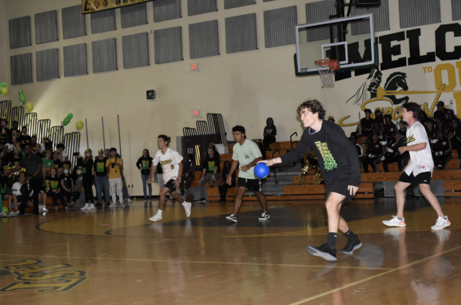 Trevor Dieste (12) playing with his winning dodgeball team at his final pep rally. 